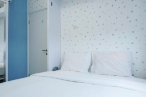Best Comfy and Modern 2BR Green Pramuka Apartment By Travelio